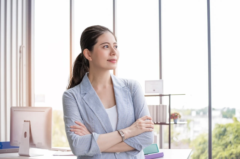 a female employee is looking into the distance