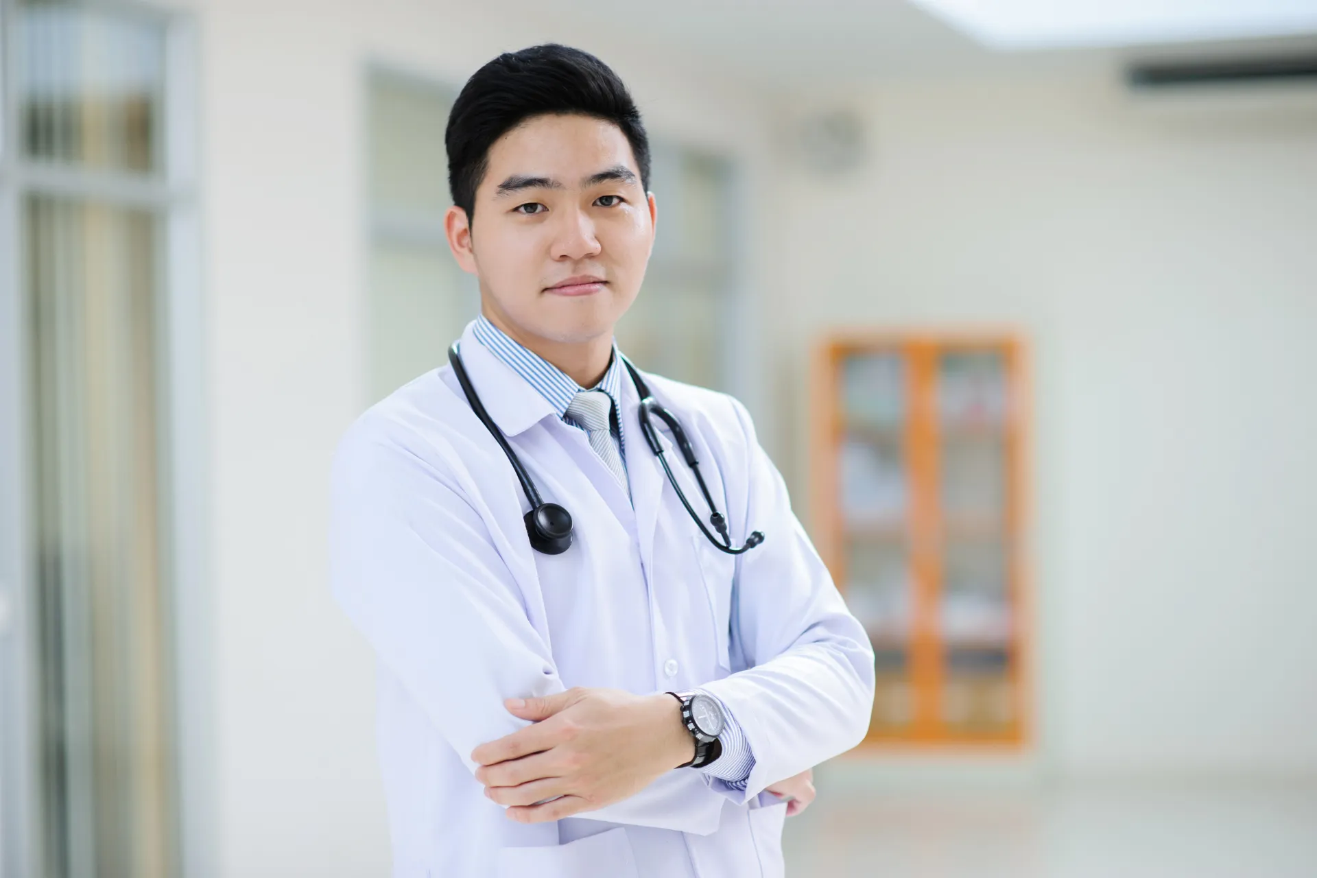 a man wearing a doctor's uniform